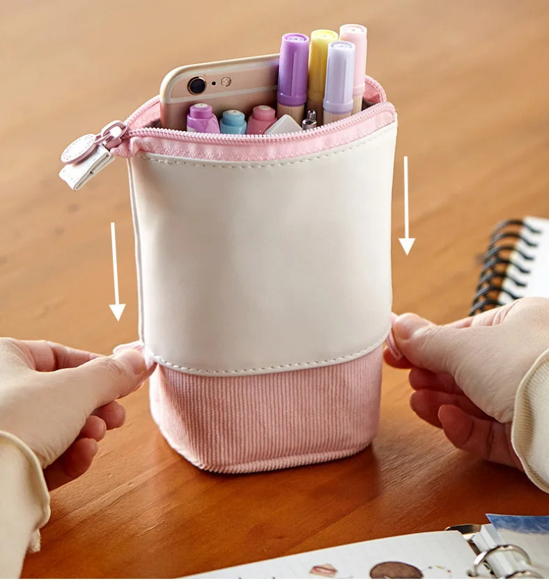 Pencil case pouch with zipper, light pink and white, open top showing stationery