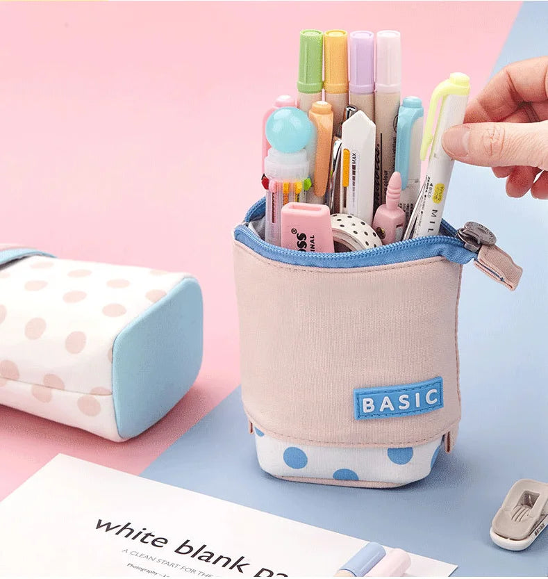 Blue-and-beige pencil case pouch with “BASIC” patch, packed with markers