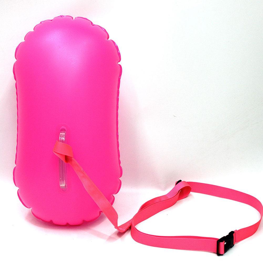 Rose pink inflatable tow buoy with air valve and adjustable webbing strap