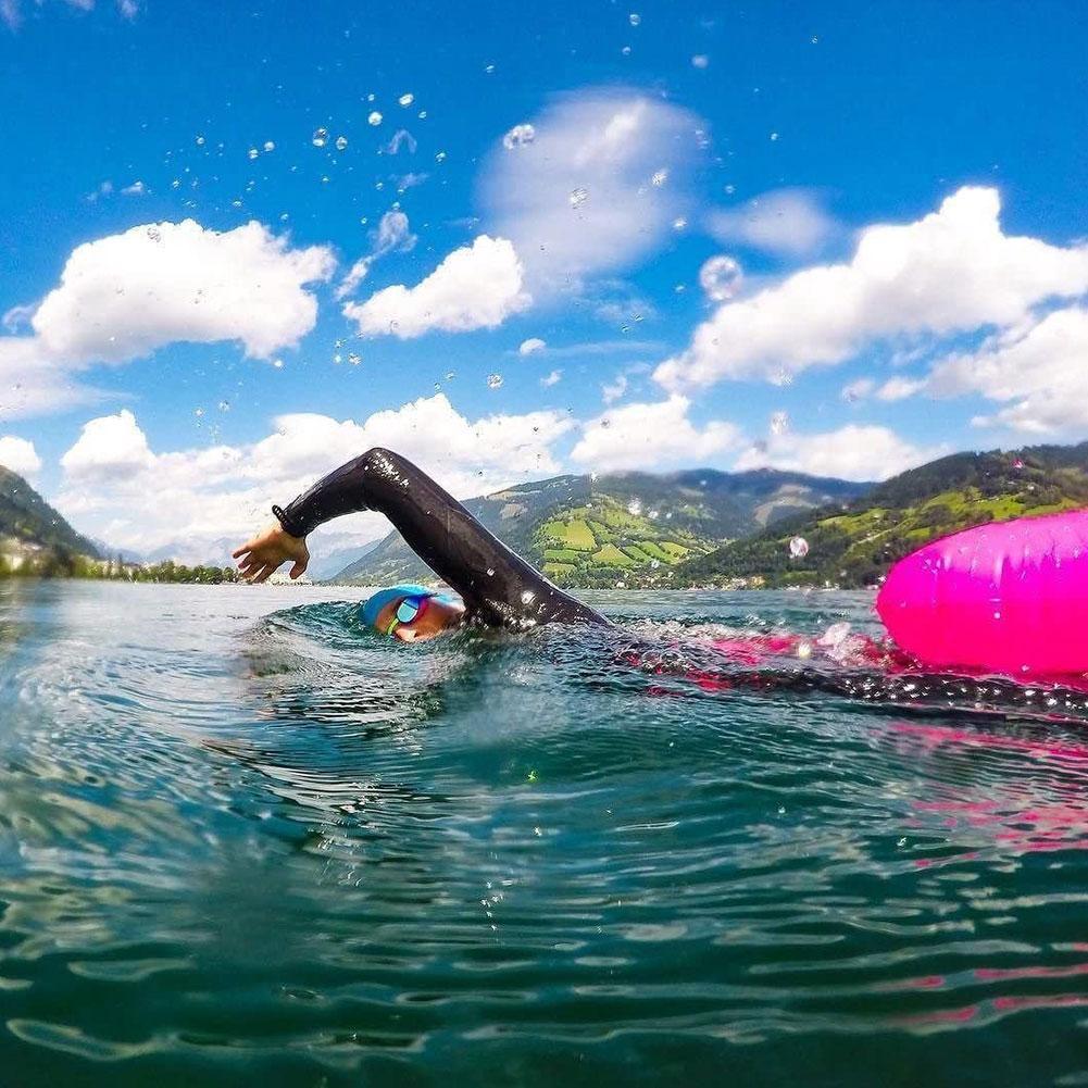 Inflatable swim buoy tow float, pink, with valve and strap loop