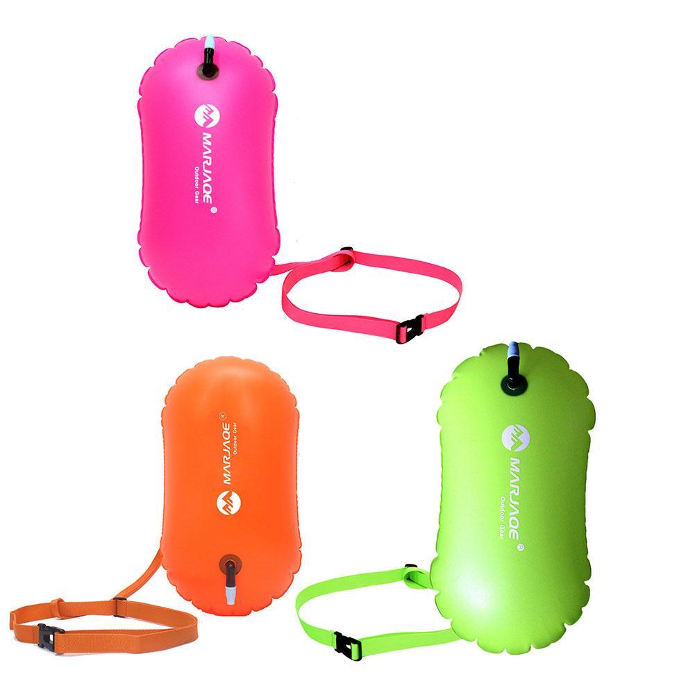 Inflatable swim buoy tow floats set in pink, orange, and green with straps