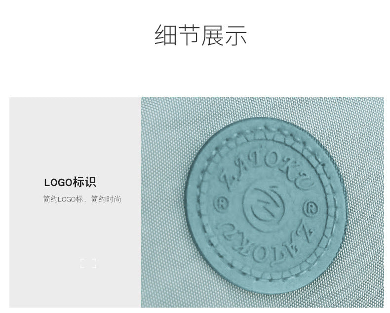 Light blue nylon bag logo badge detail on woven fabric texture