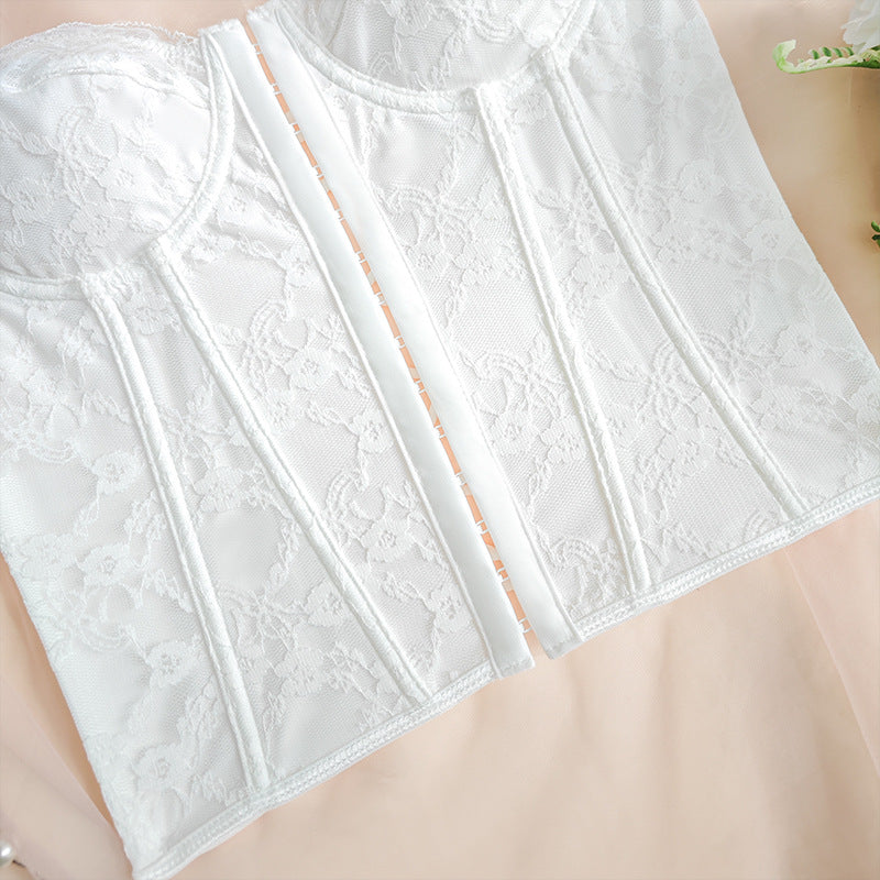 White lace corset vest front with textured floral pattern and vertical boning lines