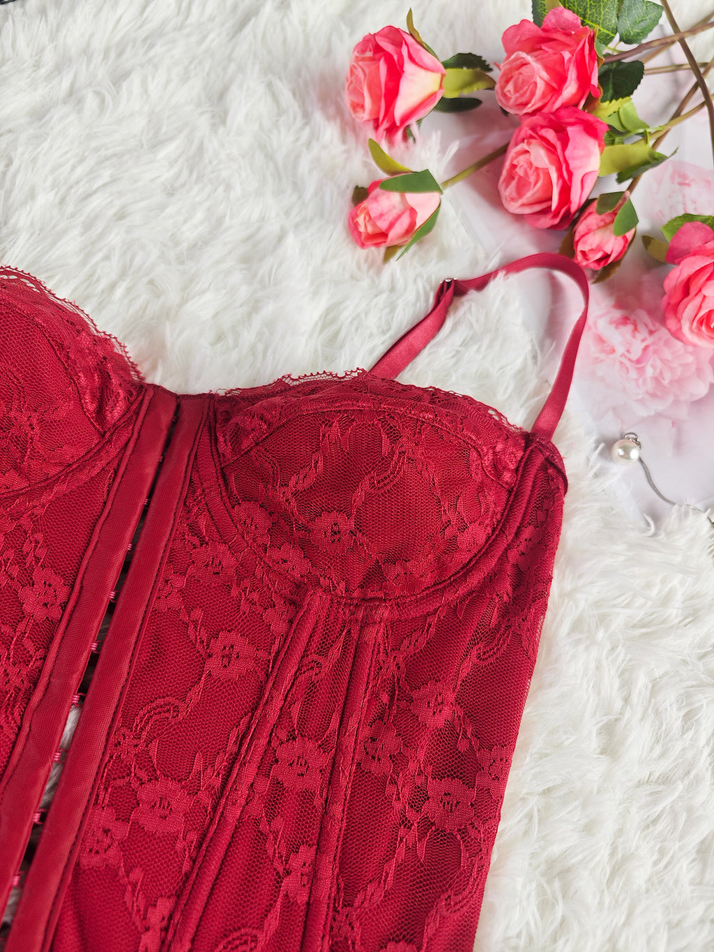 Burgundy lace corset with scalloped bust cups and thin adjustable straps
