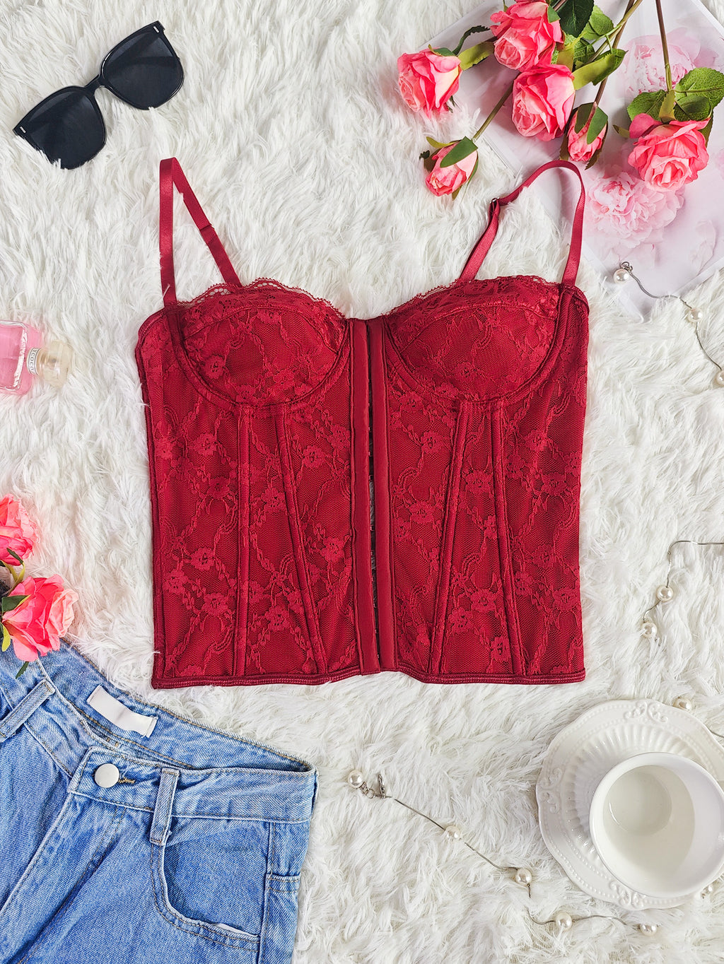 Burgundy lace corset bustier top with structured front panels and lace-up cups
