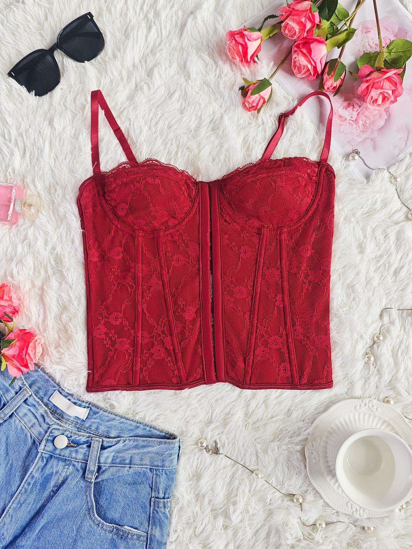 Burgundy lace corset bustier top with structured front panels and lace-up cups