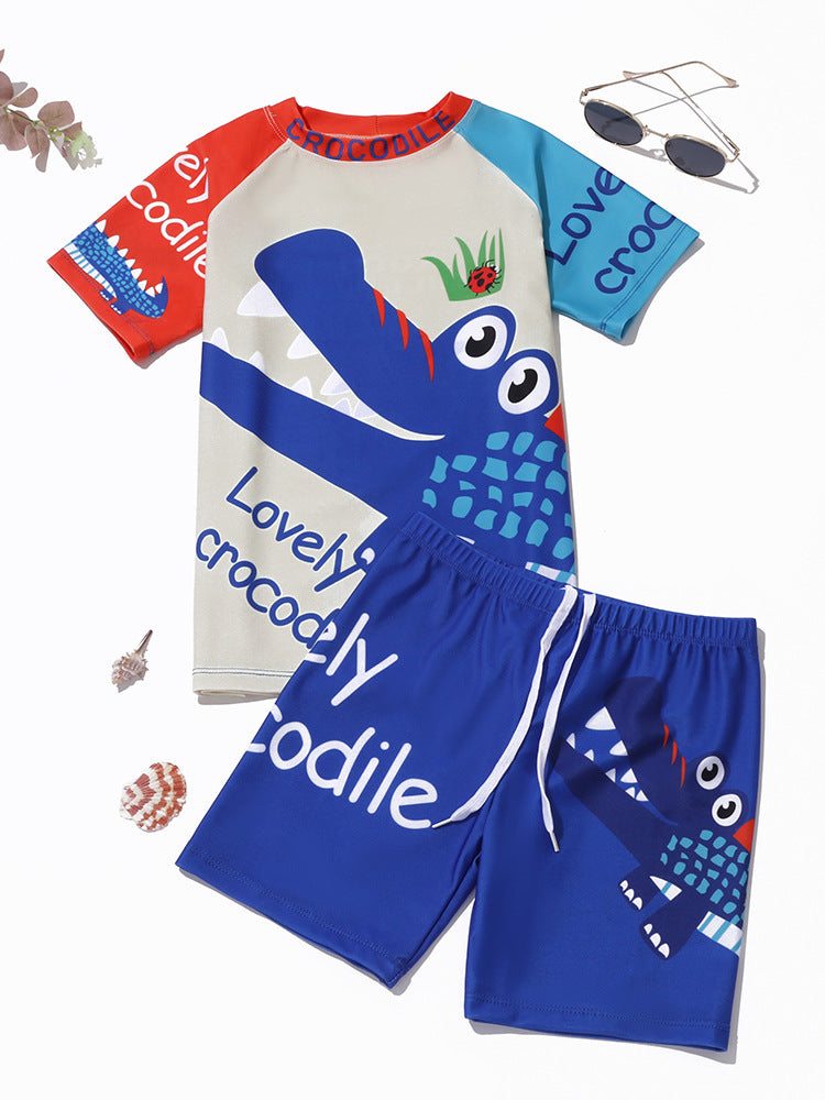 Boys’ crocodile swim rashguard and shorts set, white and royal blue cartoon print