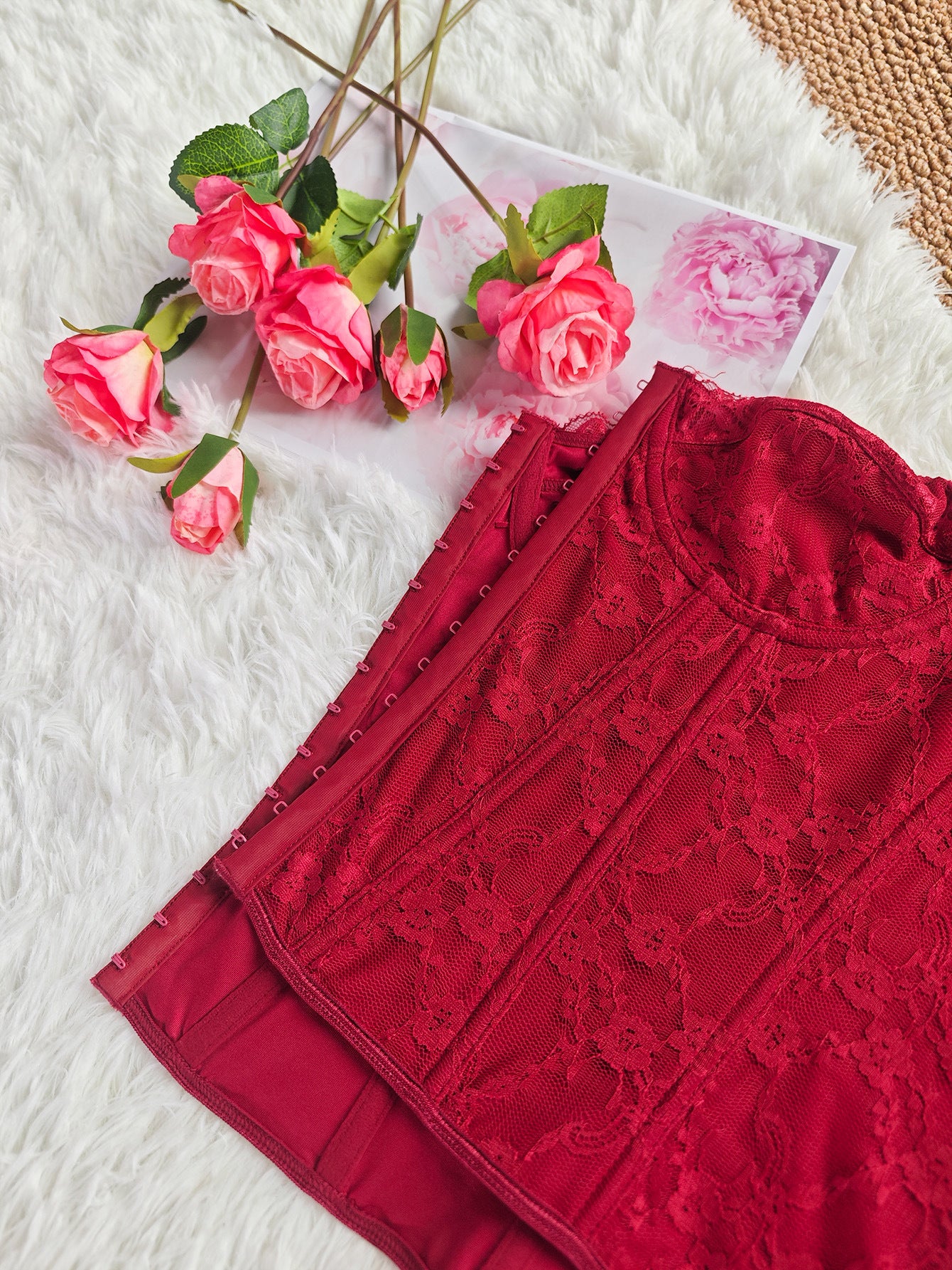 Burgundy lace corset bustier with sweetheart neckline and corset seam panels