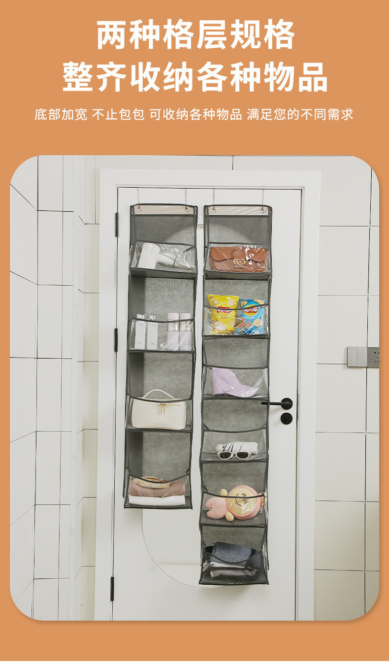 Gray wall-mounted hanging storage bag with multiple clear pockets on an over-door hook