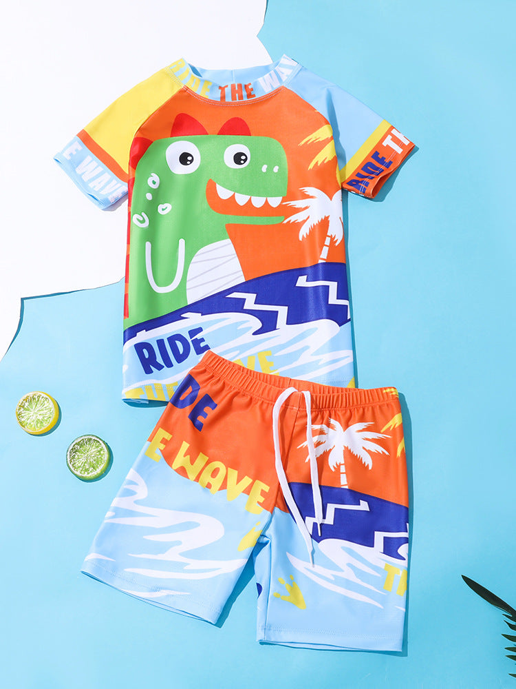 Kids' swimwear set with orange crocodile cartoon rash shirt and light blue shorts
