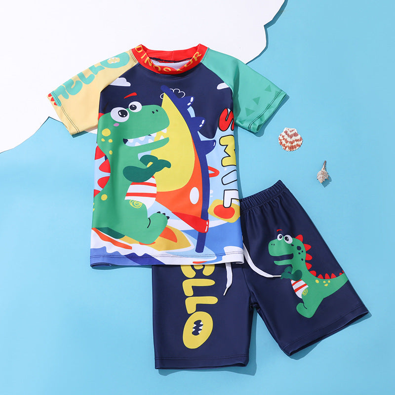 Boys’ dinosaur swim rashguard and shorts set, multicolor cartoon print with green