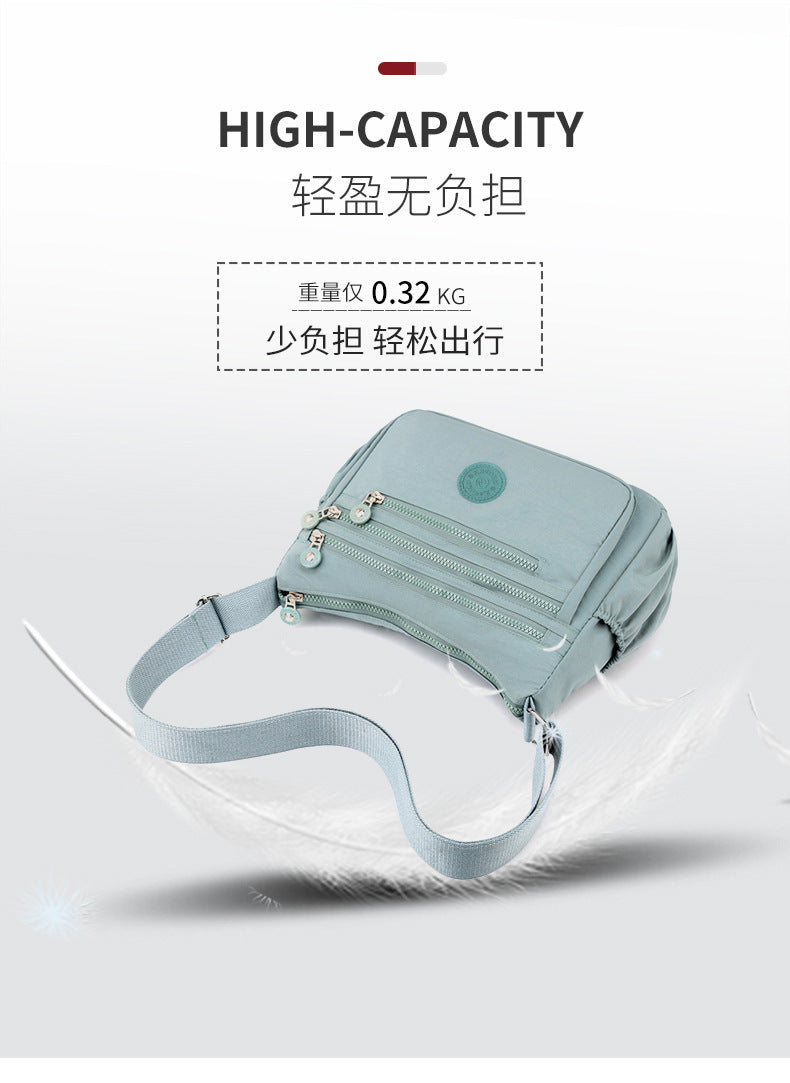 Nylon multi-layer crossbody shoulder bag, light water-blue, flap with zip pockets