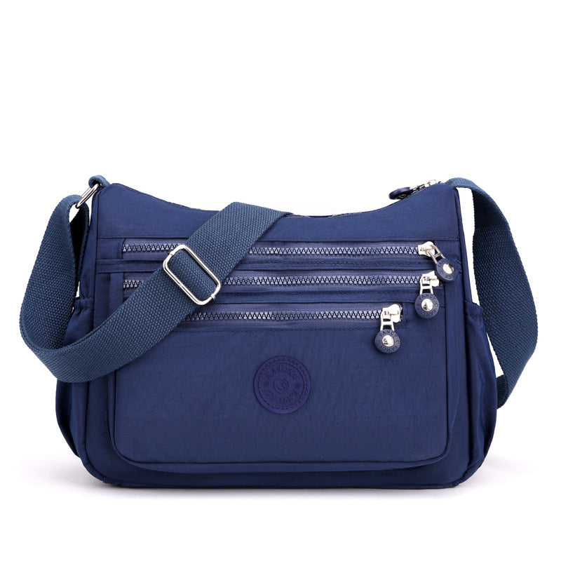 Nylon multi-layer crossbody bag, dark navy blue, adjustable strap and triple zipper