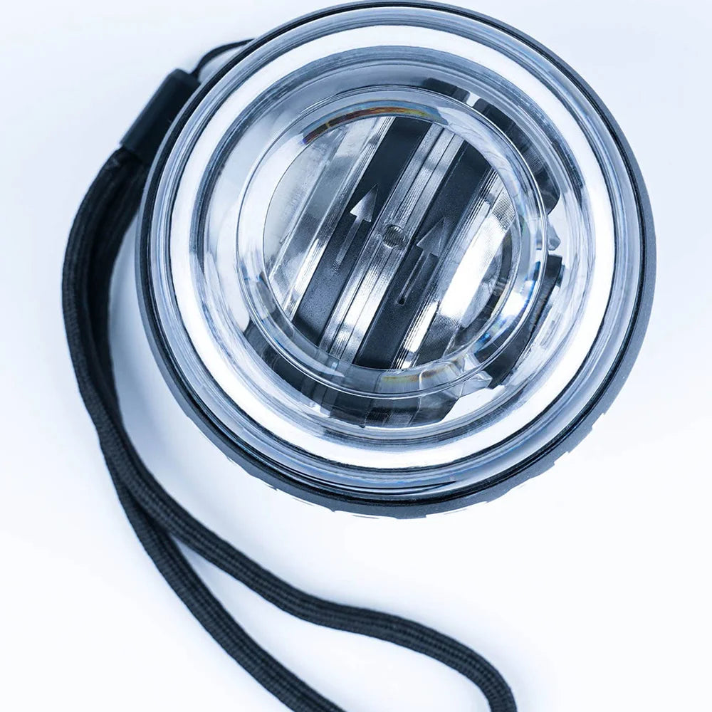 Chrome gyro ball top with black wrist strap, detailed close-up