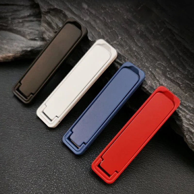 Set of ultra-thin folding phone brackets in black, white, navy blue, and red