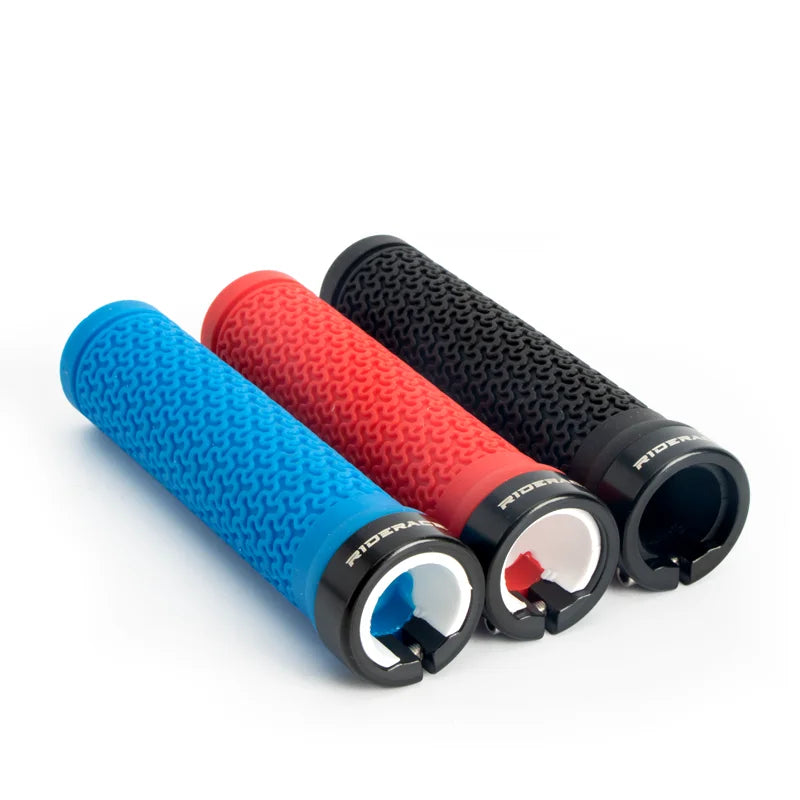 Three MTB bicycle handlebar grips: blue, red, and black with textured surface
