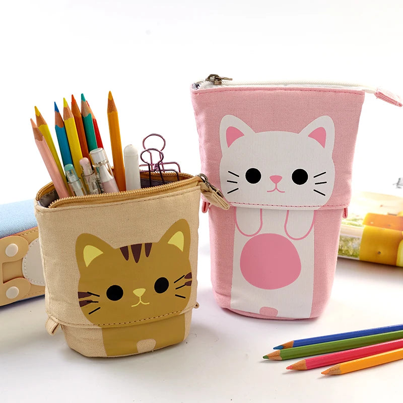Two cat-themed zip pencil pouches: pink and beige with cute face designs