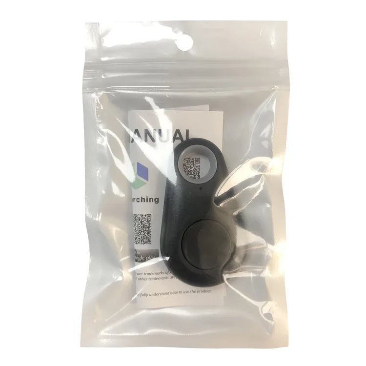 Black Bluetooth anti-lost tracker key fob in clear plastic pouch with label card