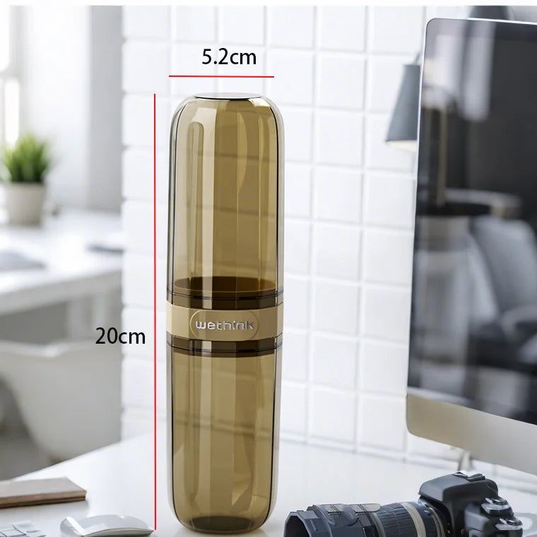 Travel toothbrush and toothpaste holder case, translucent amber cylinder with wrist strap