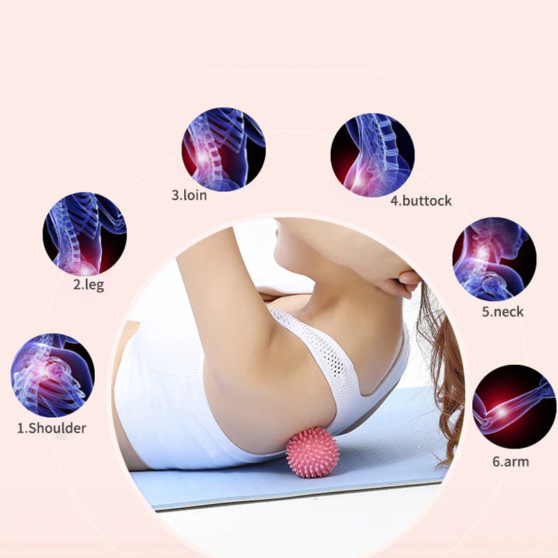 Pink spiked massage fascia ball used on the upper back while lying down
