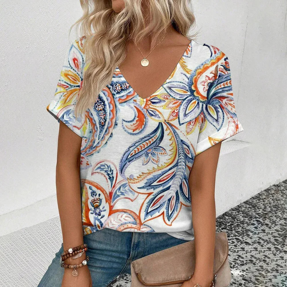 Women's plus-size V-neck T-shirt, white with blue and orange paisley print.