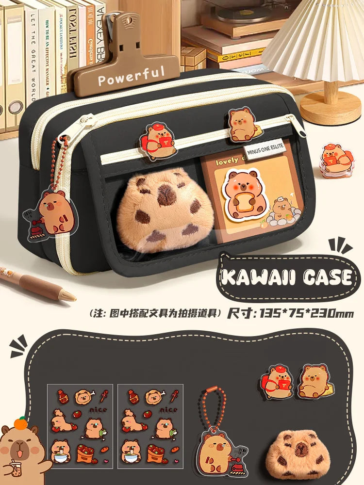 Black fabric pencil case with zipper, animal patches, and panda plush front window
