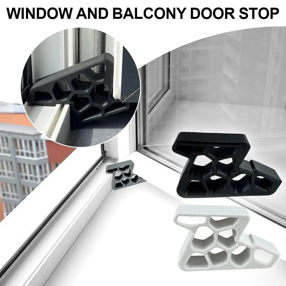Door stopper wedge in black and white, shown between window/door frame and sill