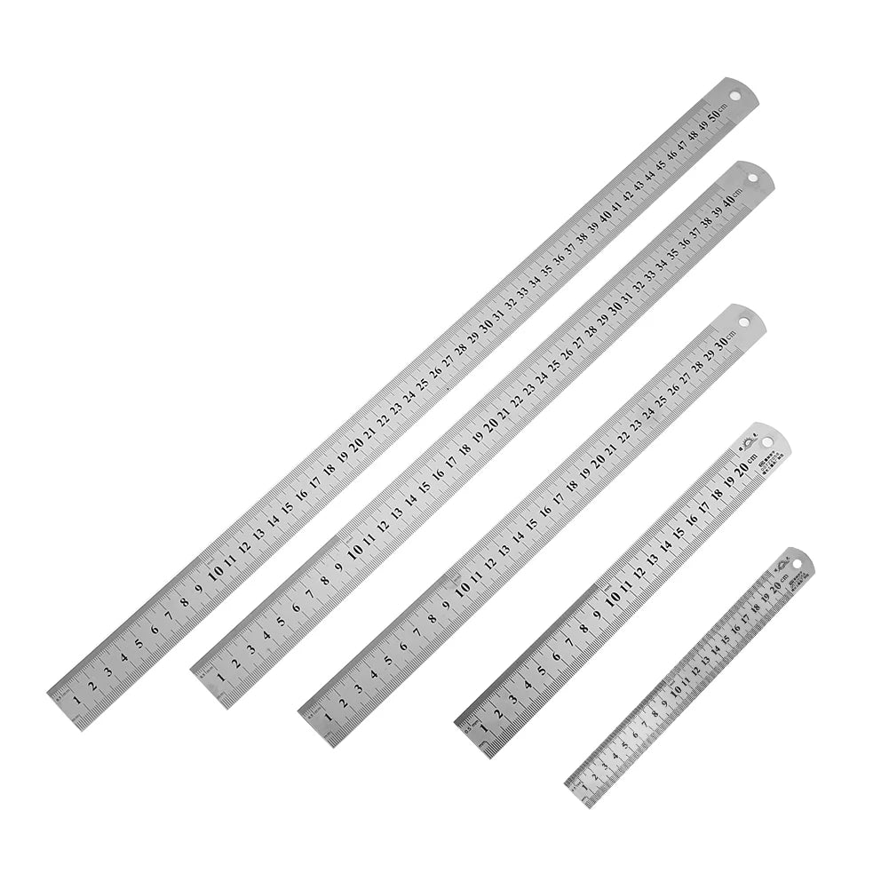Straight stainless steel rulers in a set, five pieces, each with measurement markings