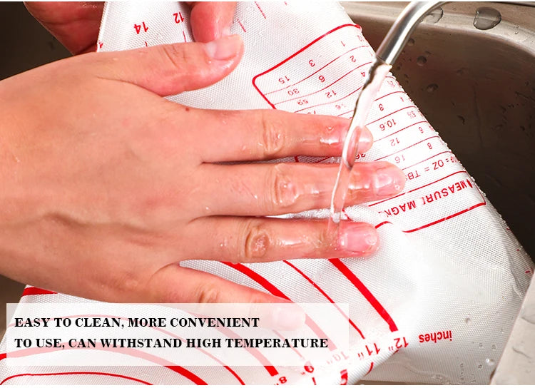 Silicone dough mat with red grid lines, kneading dough with hands