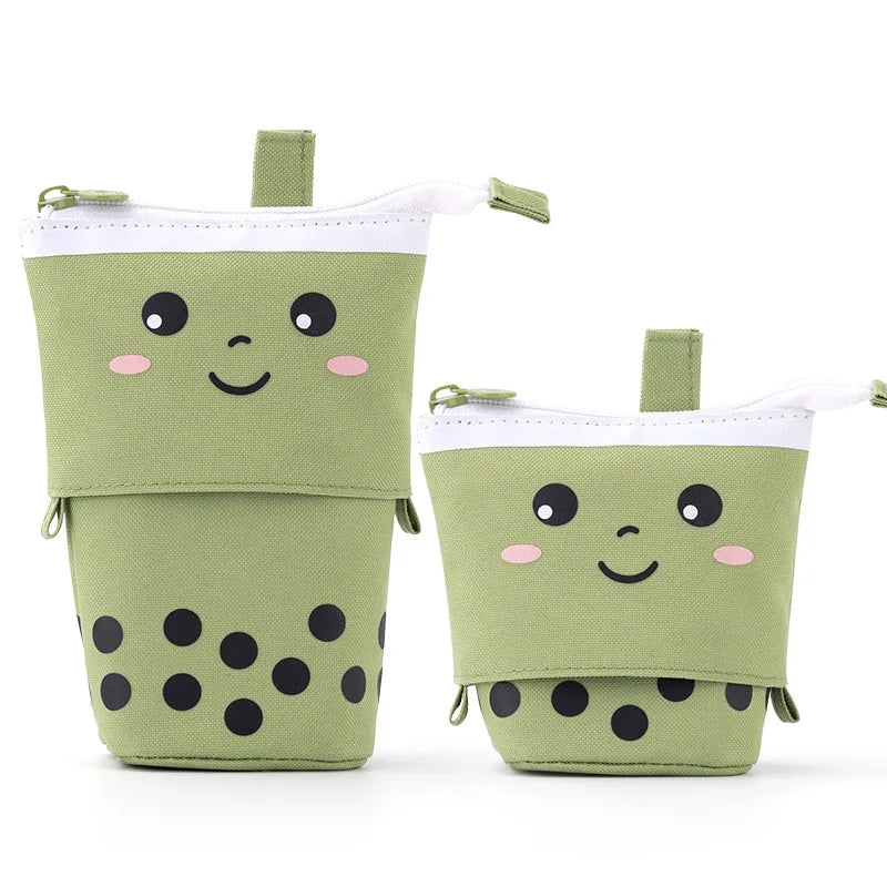 Canvas pencil pouches with zipper, green cat face with black polka-dot bottom.