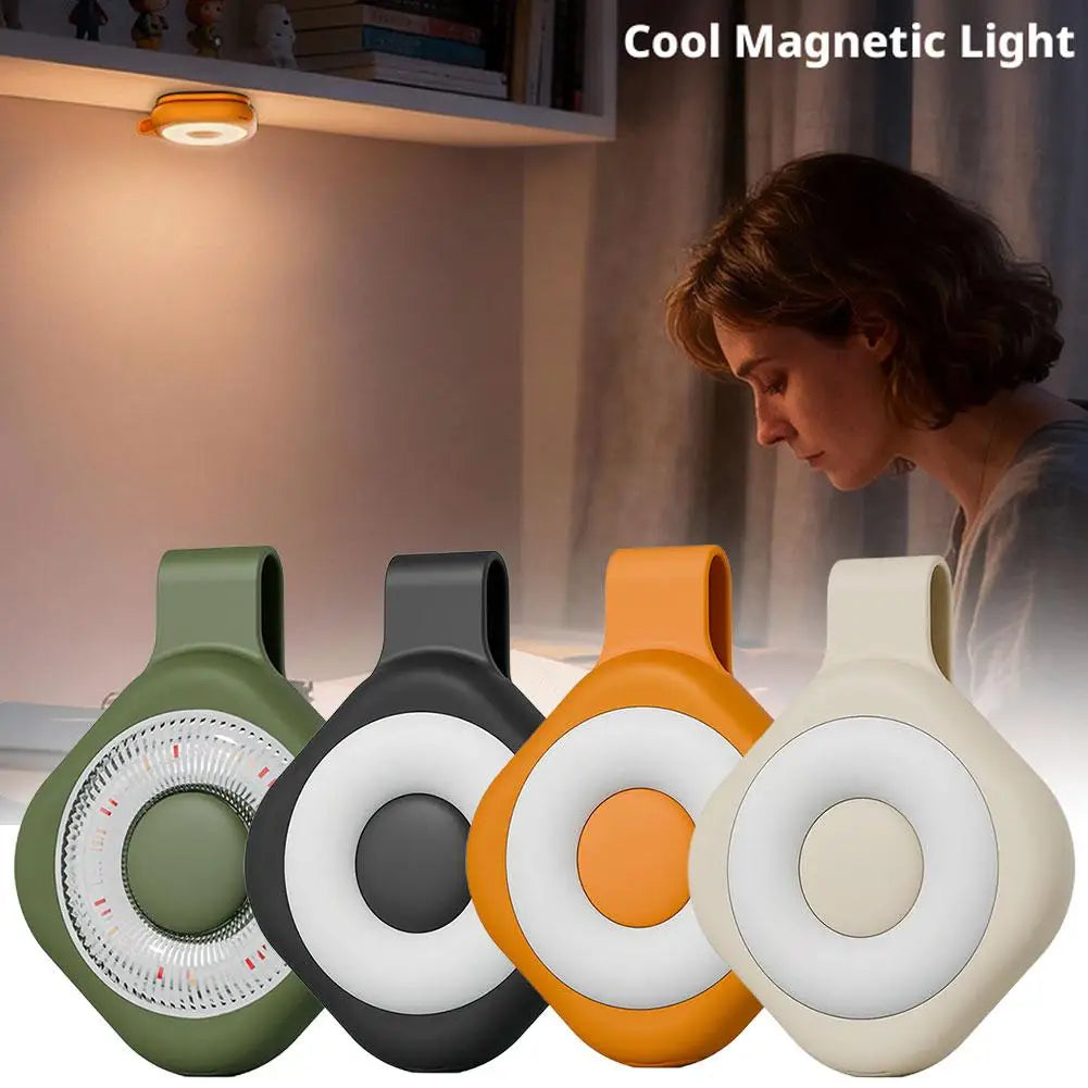 Four mini magnetic LED phone lights in olive green, black, orange, and beige