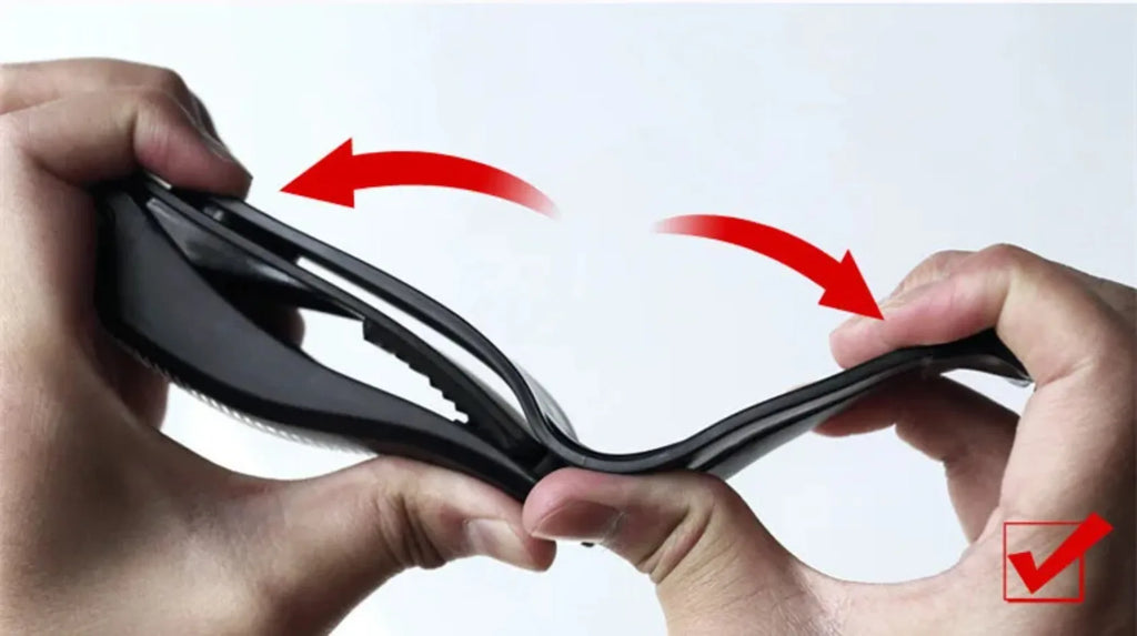 Hands installing a black spring-style car phone holder bracket