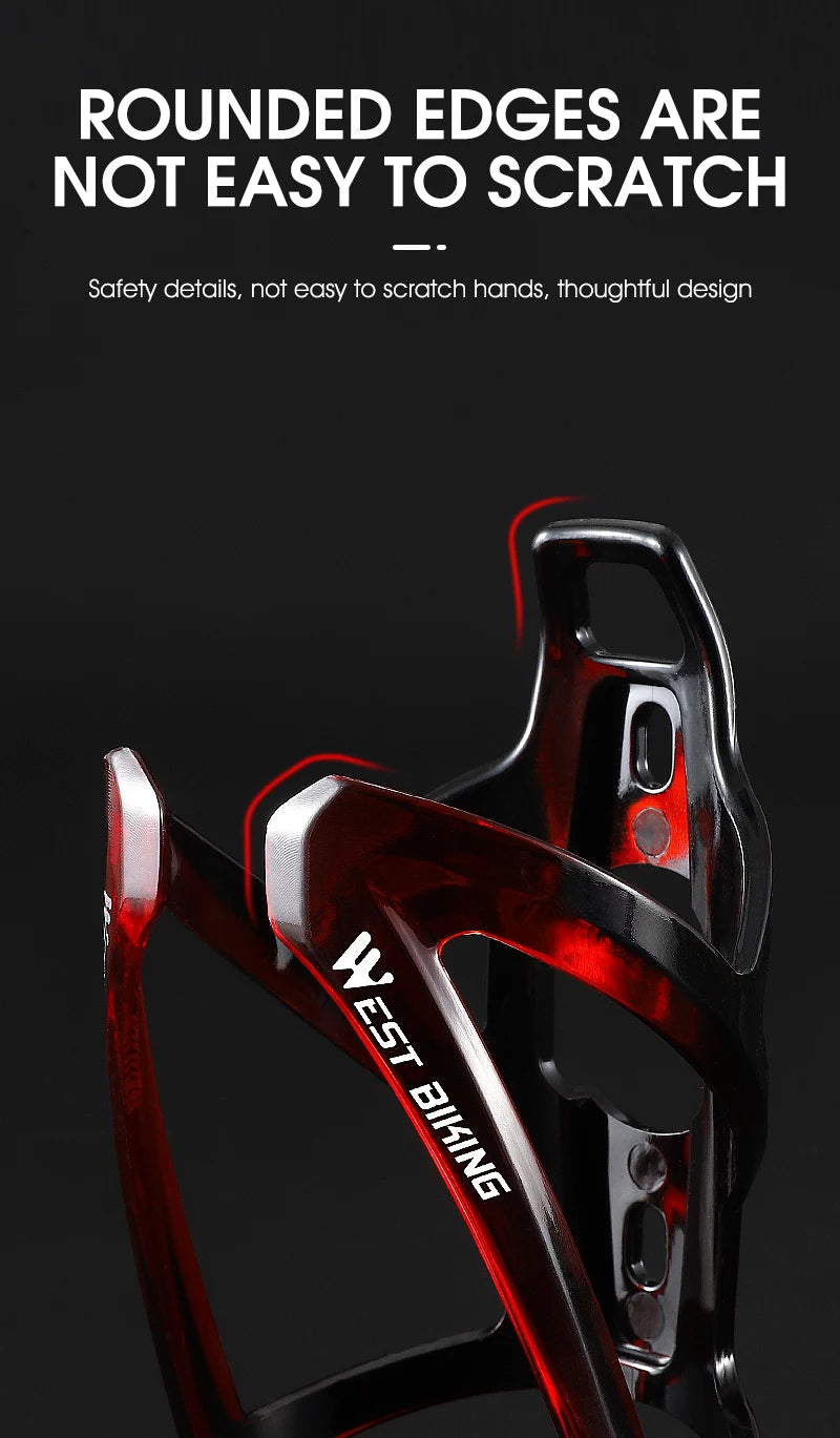 Red and black bike water bottle cage with curved handle and mounting holes.