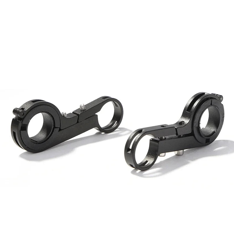 Dual clamp handlebar extender with round mounting openings and black metal arms