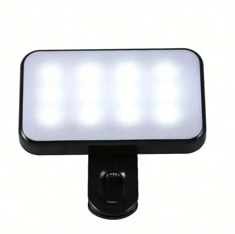 Black clip-on LED fill light with glowing rectangular panel
