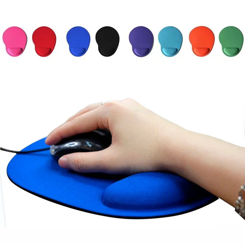 Blue mouse pad with cushioned wrist rest and non-slip base, no mouse shown