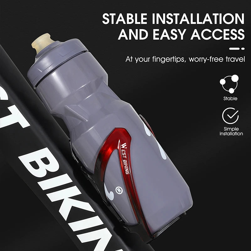 Gray bicycle water bottle cage mounted on a bike frame for easy bottle access
