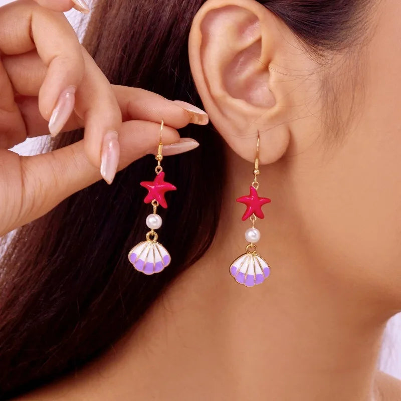 Pearl beaded starfish shell dangle earrings with gold hook, pink starfish and purple scallop