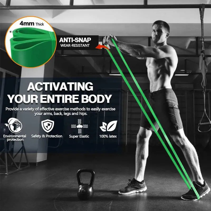 Green resistance loop band used for body activation exercise with foot placement