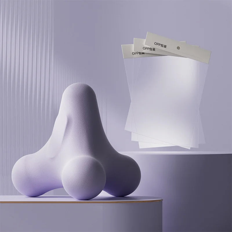 Lavender fascia massage ball with three white accessory cards in display set