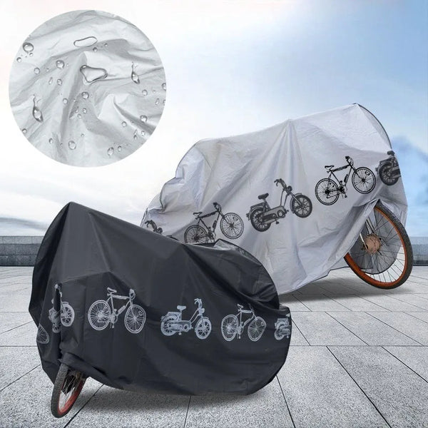 Waterproof bike cover in gray with bicycle print, shown on a bicycle wheel end