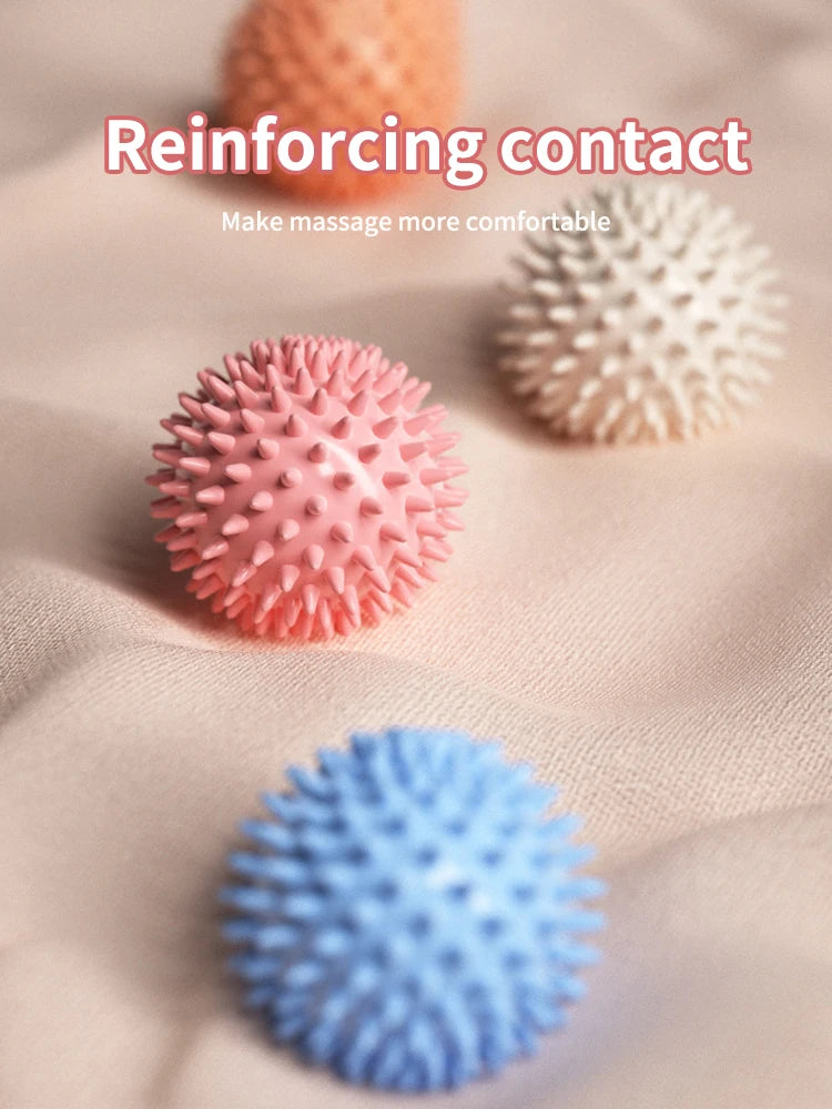 Pink and blue spiked massage fascia balls for comfortable contact massage