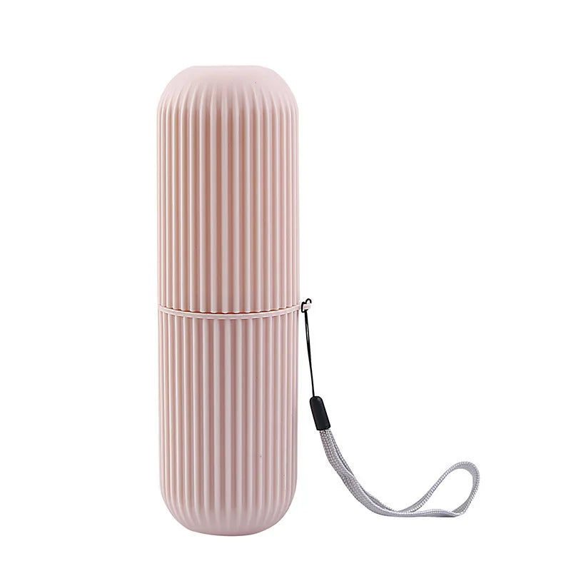Pink ribbed toothbrush holder case with wrist strap, rounded top and spout