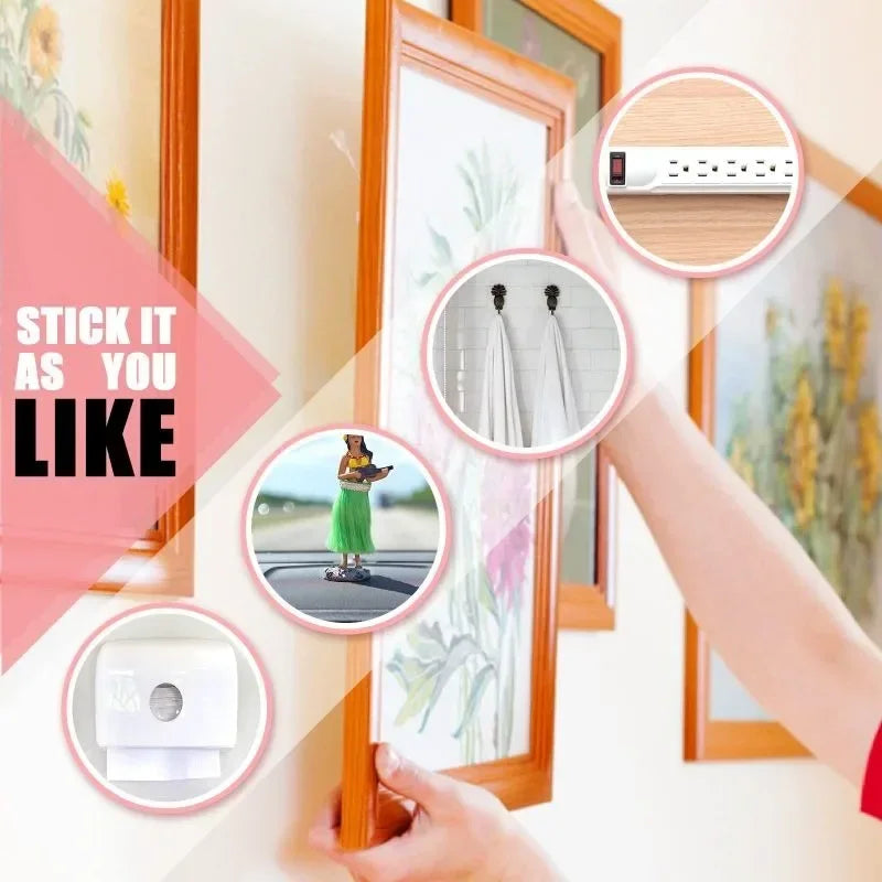 Transparent double-sided stickers attached to a window for hanging items.
