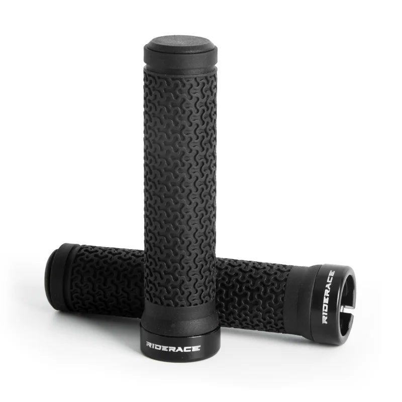 Pair of black MTB bicycle handlebar grips crossed, textured rubber with end caps