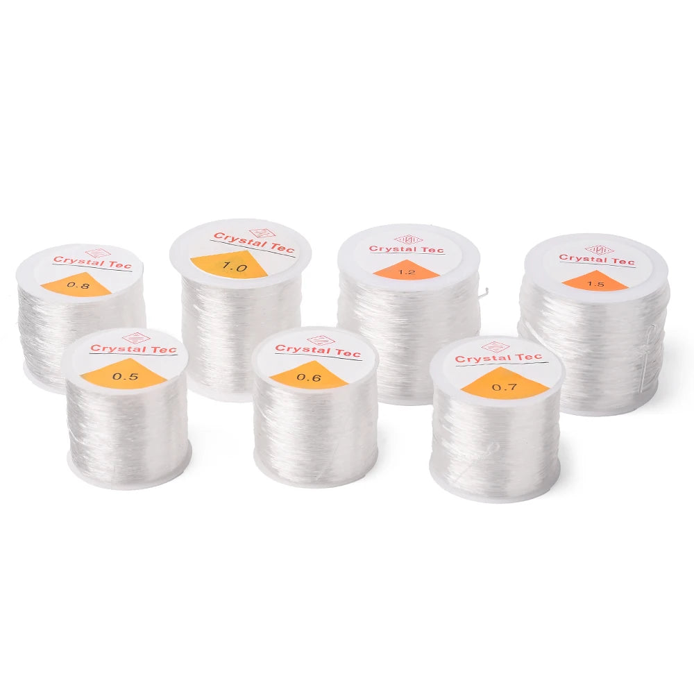 Assorted white elastic cord spools for jewelry making