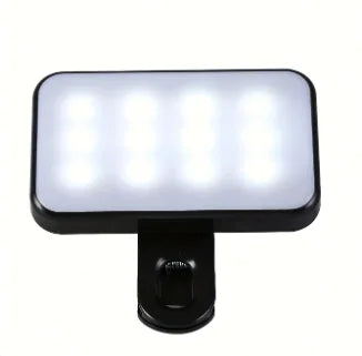 Black rechargeable mini selfie fill light with rectangular light panel and clip mount