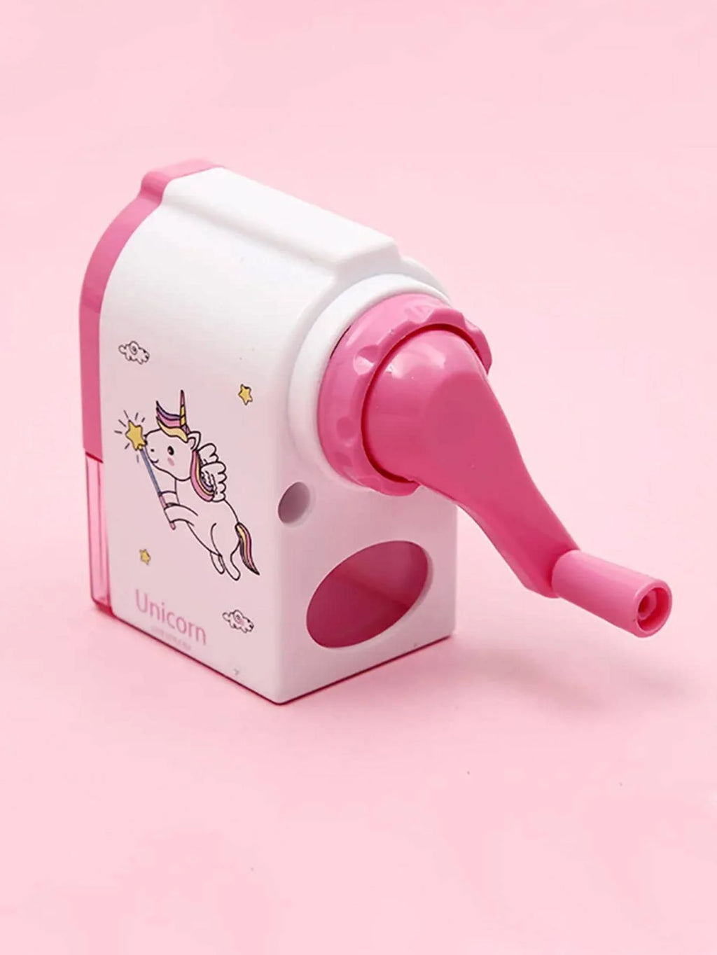 Pink rotary pencil sharpener with unicorn decal and hand crank handle