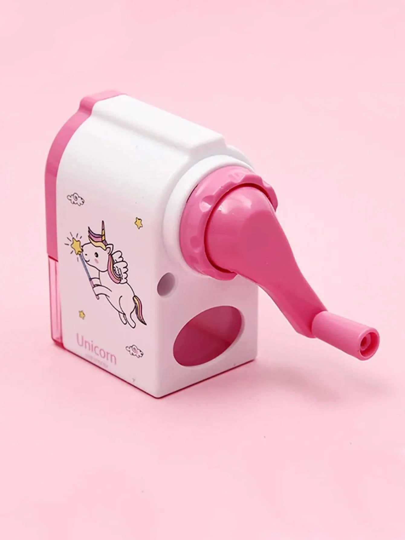 Pink rotary pencil sharpener with unicorn decal and hand crank handle