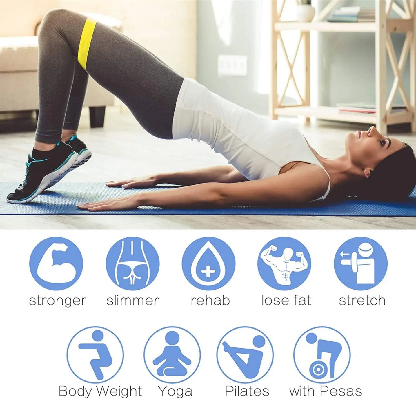 Yellow resistance loop band placed over thighs for glute bridge exercise